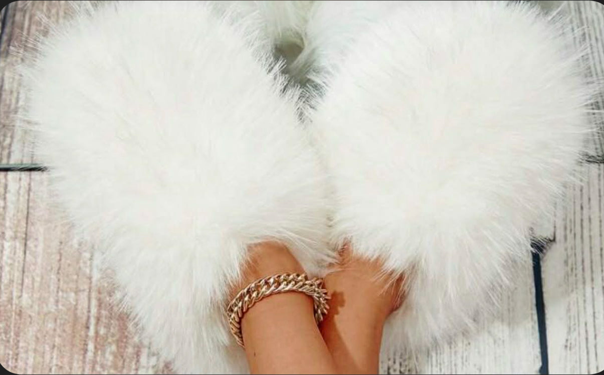 Ultra-soft fluffy house slippers designed for comfort and style. Featuring plush faux fur and a cozy closed-toe fit, perfect for relaxing at home while still looking cute.