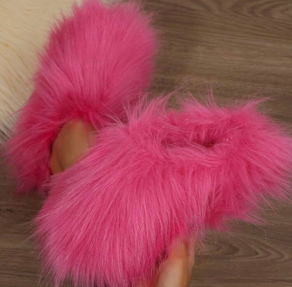 Ultra-soft fluffy house slippers designed for comfort and style. Featuring plush faux fur and a cozy closed-toe fit, perfect for relaxing at home while still looking cute.